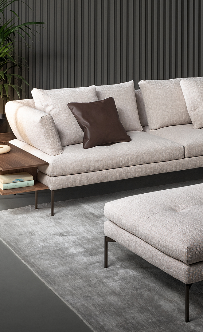 Dettaglio divano componibile Aliante con tessuto e pelle