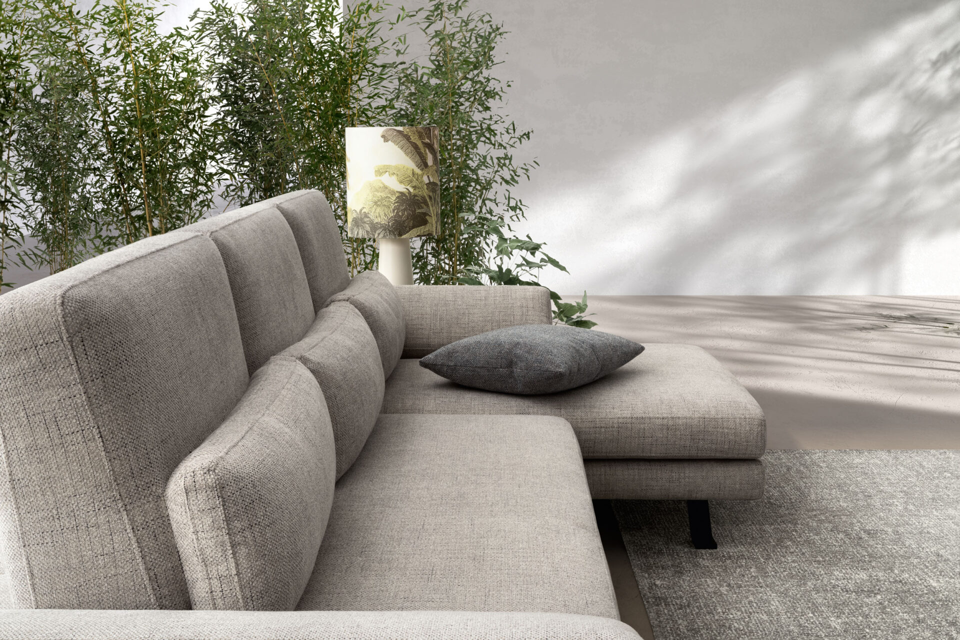 Dettaglio bracciolo reclinabile divano Boss