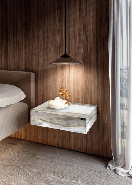 Comodino Materia sospeso a muro in camera da letto