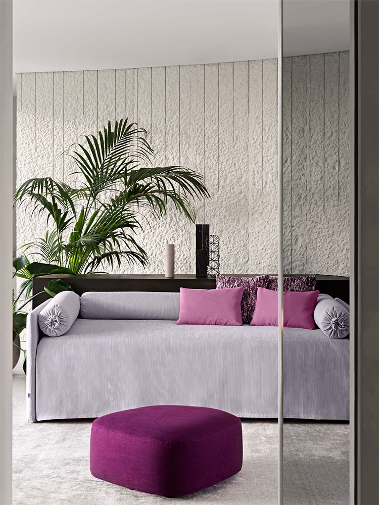 Letto Duetto con cuscini a rullo e buste porta guanciale