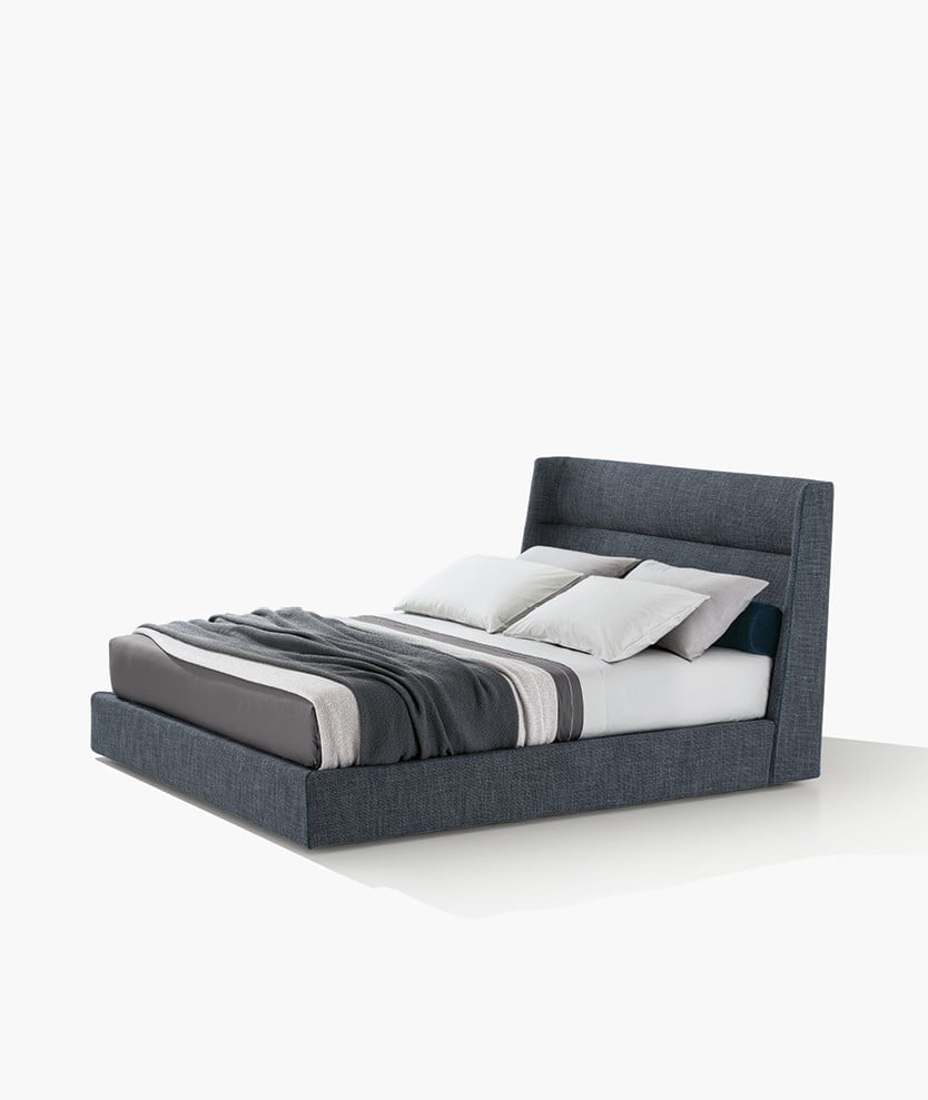 Letto Chloe Poliform con testata avvolgente in tessuto