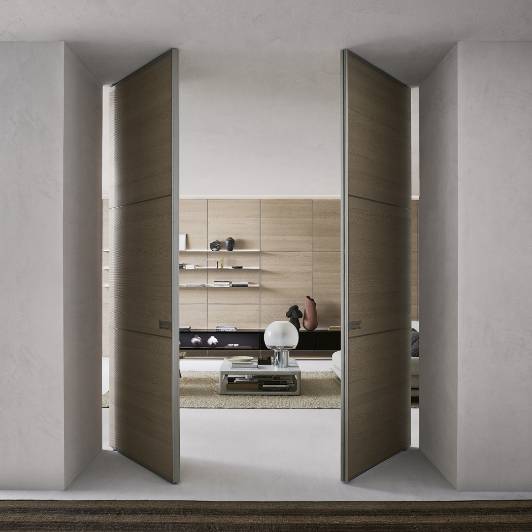 Dettaglio maniglia porta Radius con finitura bronzo